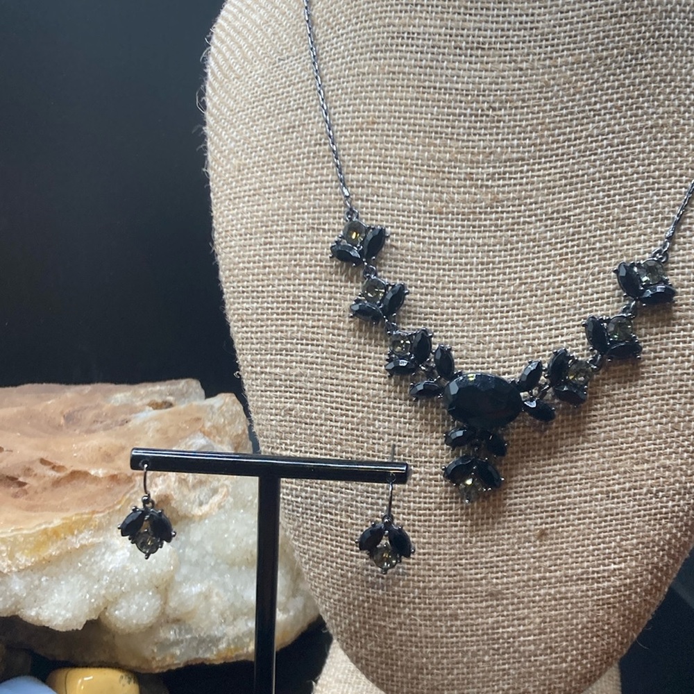 2007 Avon gunmetal and rhinestone earring and necklace set.